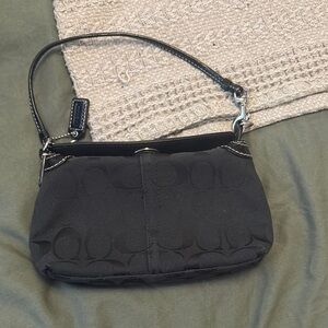 Elegant Black Coach Handbag